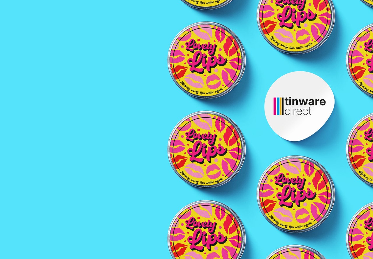 Makeup tins on a blue background with the Tinware Direct logo on a white label.